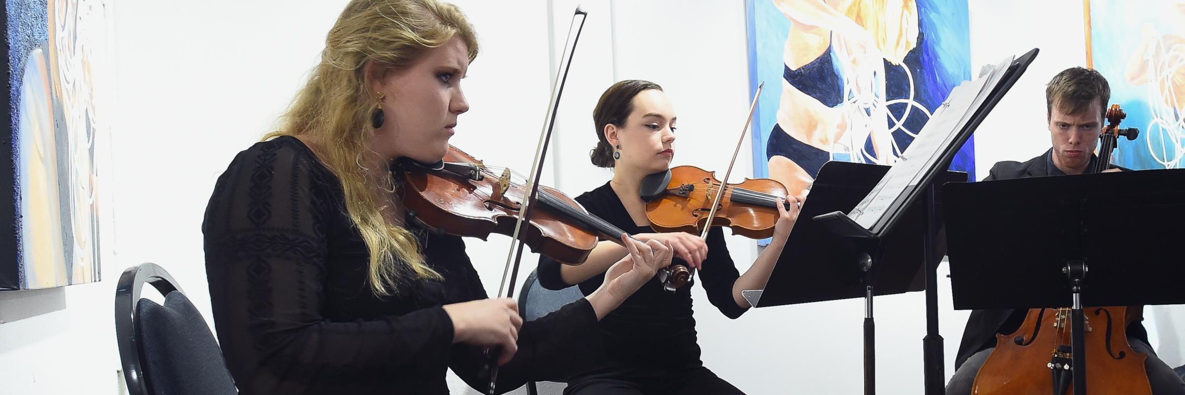 Trio performs in Salve Regina Gallery