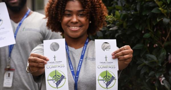 NCSSS student with Compass program flyer