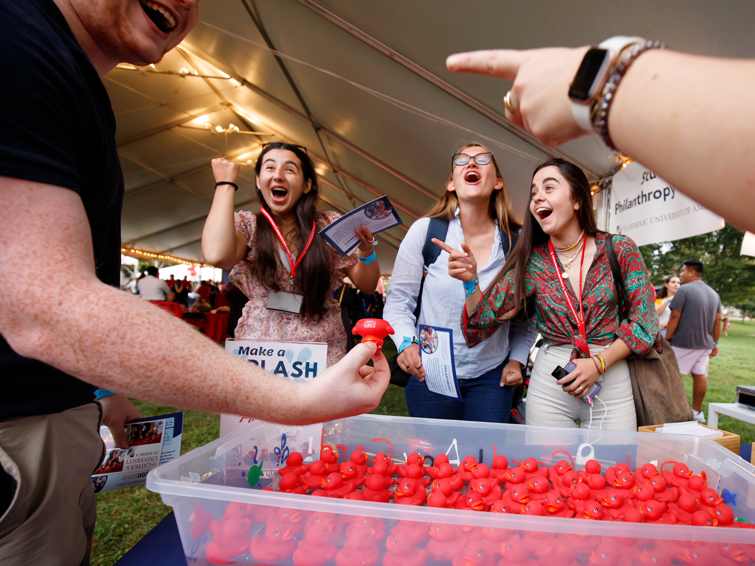 Students and alumni have fun at the 1887 Society booth