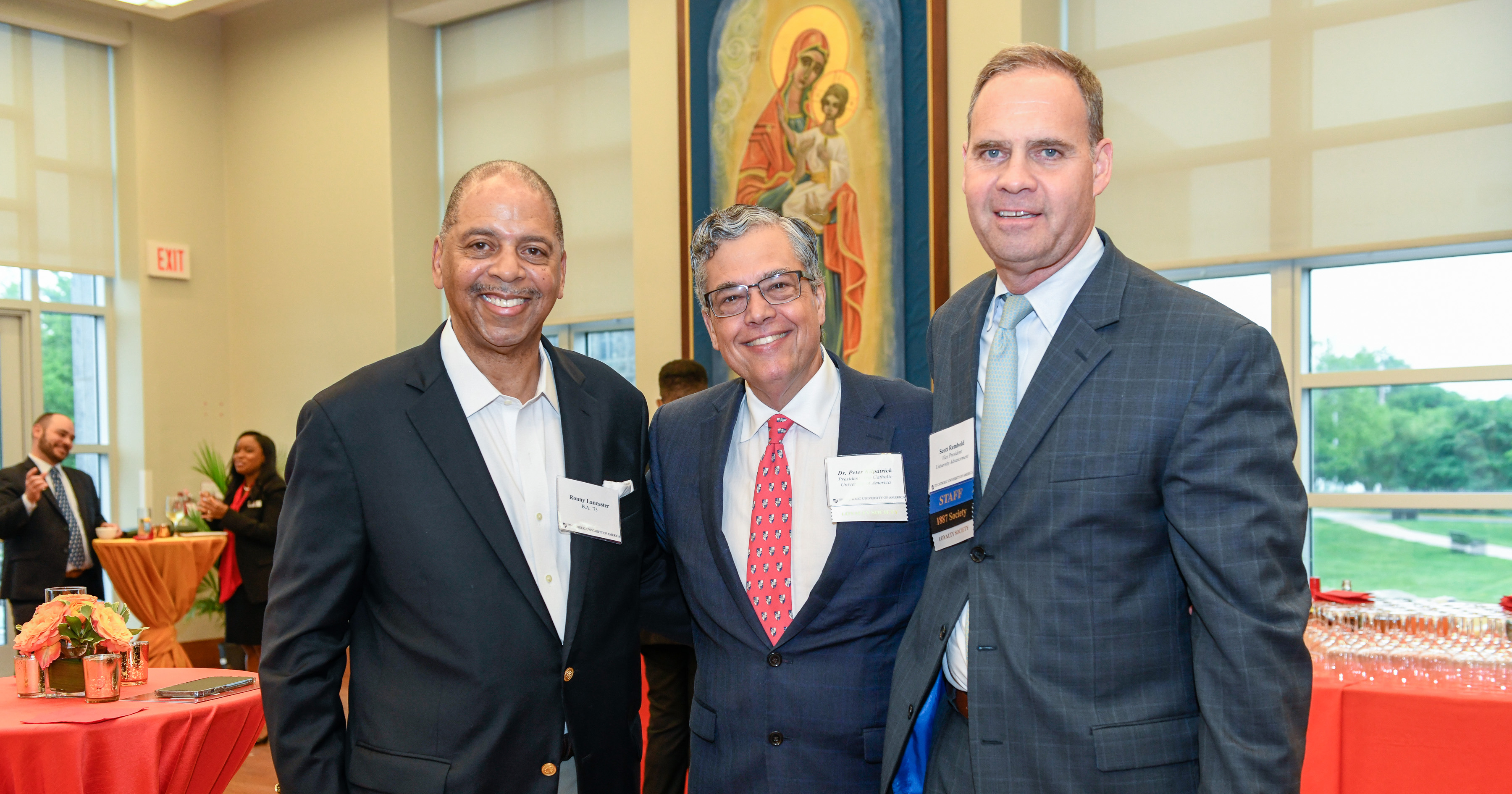 University leadership poses with Partnership Program celebration attendees