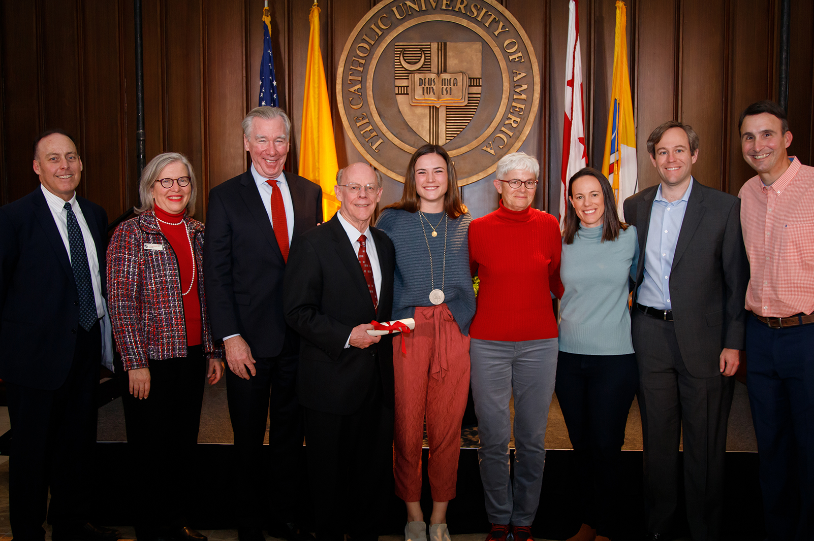 Bridget Power with the Roberts family and University leaders