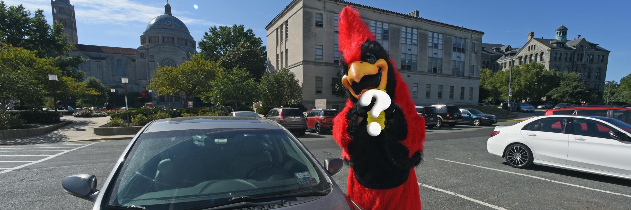 Red holds a parking ticket in the Mullen lot