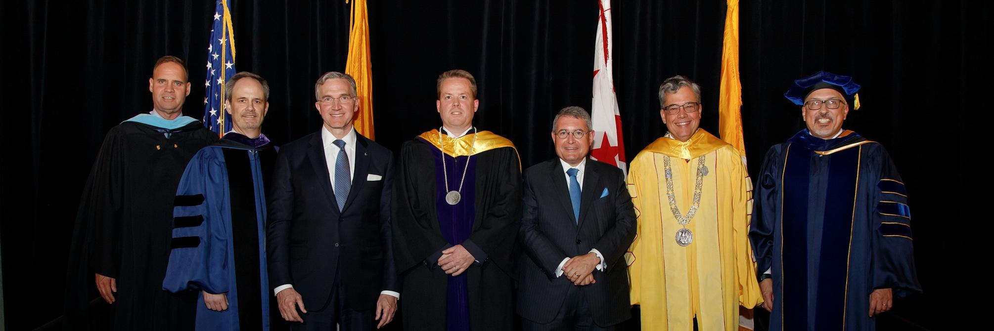 Professor Kevin Walsh poses with University leadership and donors