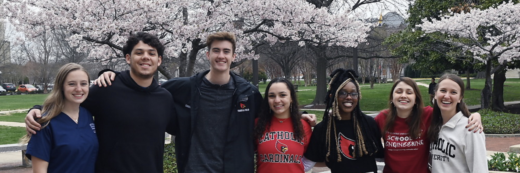 Students pose for a photo on campus