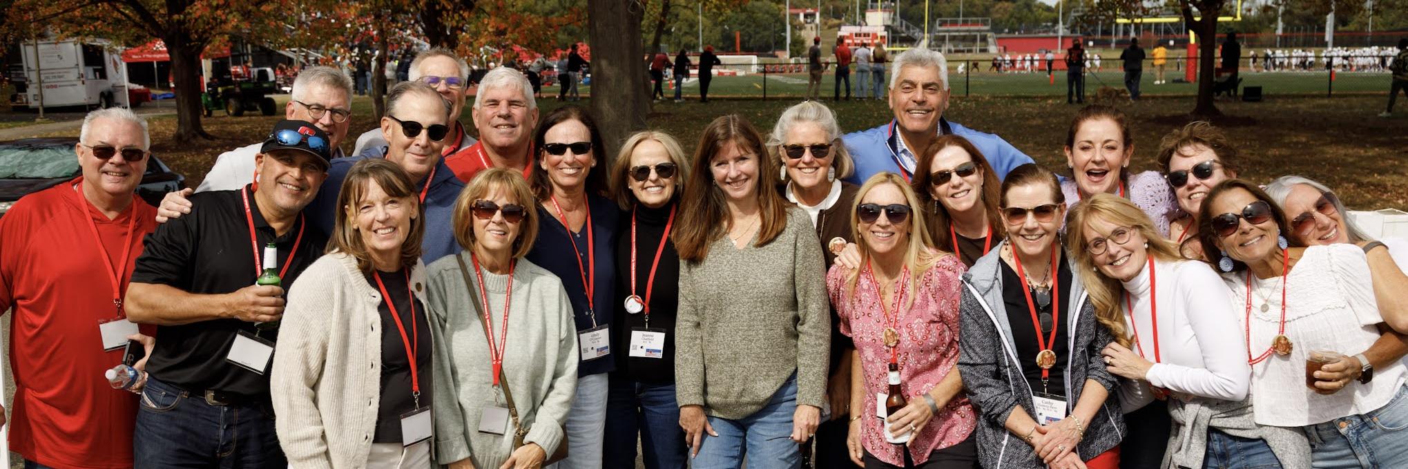 Large group of alumni at the Tent Party event