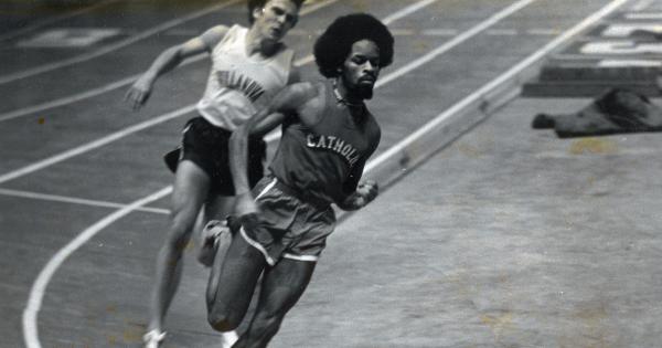 Clarence Musgrove running on a track