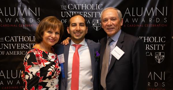 Luigi Alvarado with his parents