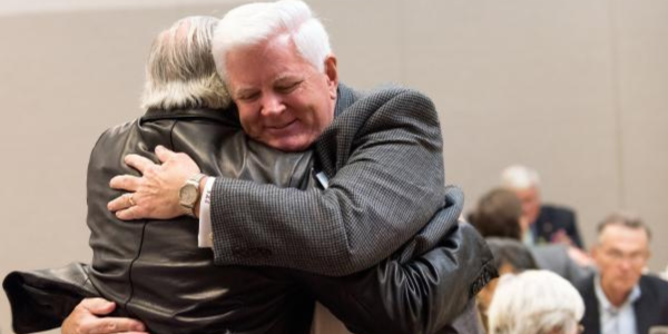 Golden Cardinals hugging