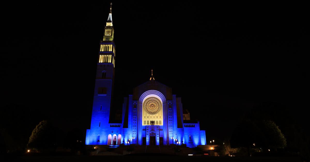 Basilica lit blue at night