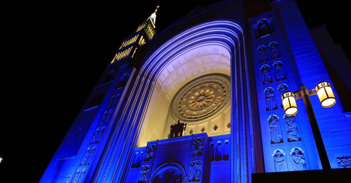 Basilica lit blue at night