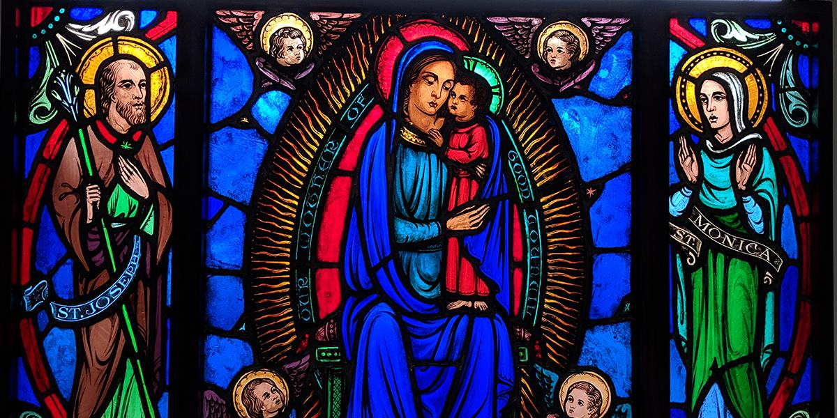 Stained glass image of the Holy Family