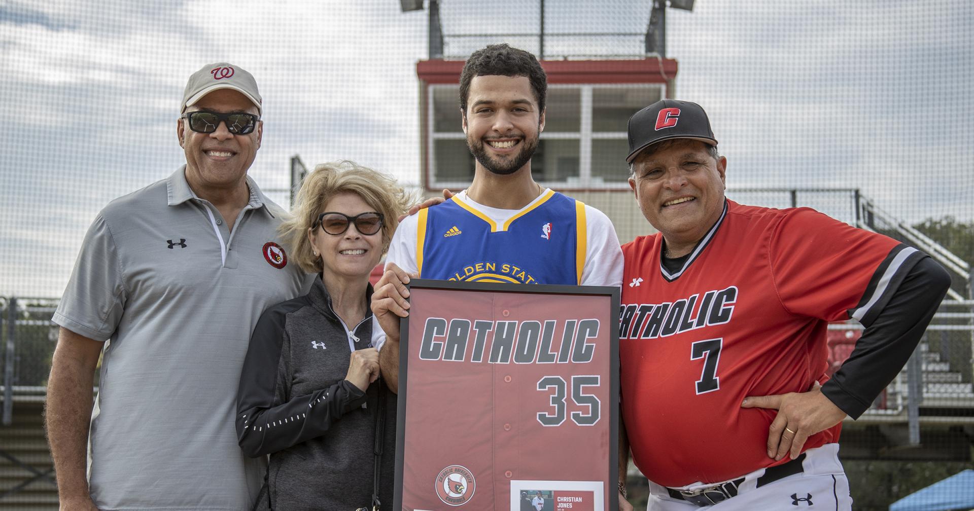 Jones Family poses with Baseball Head Coach Ross Natoli